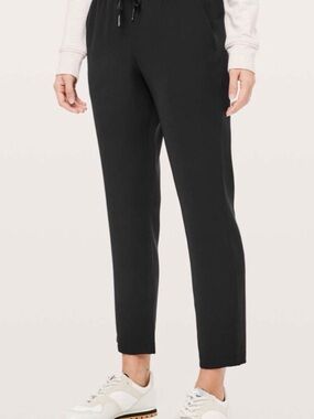 lululemon athletica On The Fly Woven Black Tapered Pant